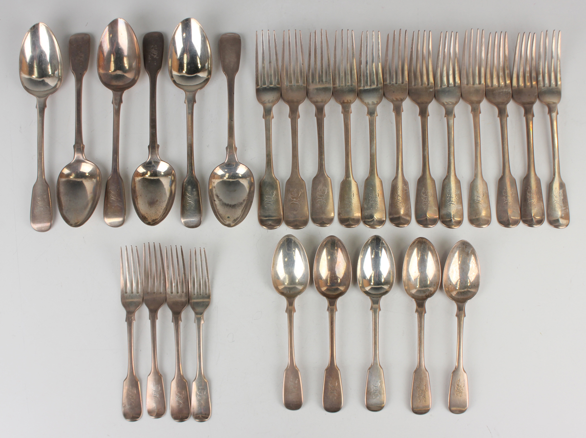 A Victorian part canteen of silver Fiddle pattern cutlery, comprising six tablespoons, nine table