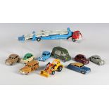 A small collection of Dinky Toys vehicles, comprising Morris Oxford, green and cream, Triumph,