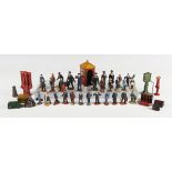 A collection of Hornby and other lead figures, including station staff and railway passengers,