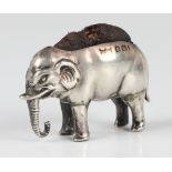 An Edwardian silver novelty pin cushion in the form of an elephant, Birmingham 1907 by Robert