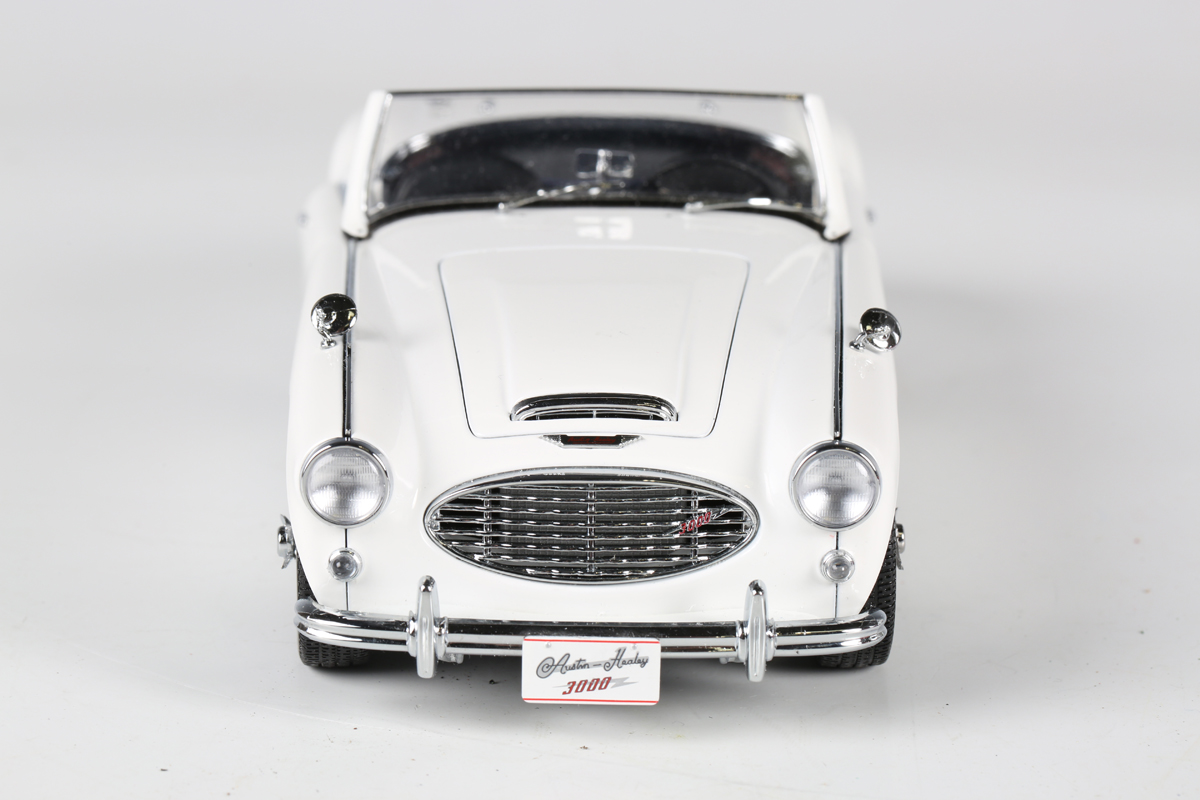 Two AutoArt 1:18 scale model cars, comprising Austin Healey 3000 and MGB GT Coupe MKII, both boxed - Image 15 of 22