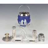 A George V silver mounted Wedgwood blue jasperware biscuit barrel and cover with swing handle,
