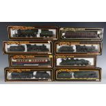 A collection of Mainline gauge OO railway items, including eight steam locomotives and tenders,