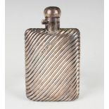 A late Victorian silver hip flask with diagonally ribbed decoration, Chester 1896 by Stokes &