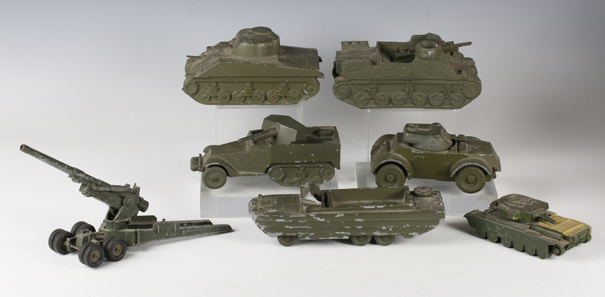 Seven diecast Second World War military vehicles, including Sherman tank, armoured car half-track,