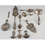 A German silver caddy spoon, cast with figural handle and landscape to bowl, import mark Chester