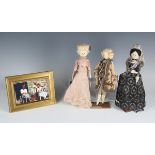 A collection of wooden peg-type costume dolls, mid/late 20th century, each with painted features (
