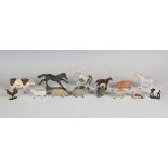 A collection of Britains and other lead and plastic farm animals and accessories, including cows,