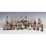 Twenty-four Stadden Studio painted metal military figures, including Winston Churchill, Musician