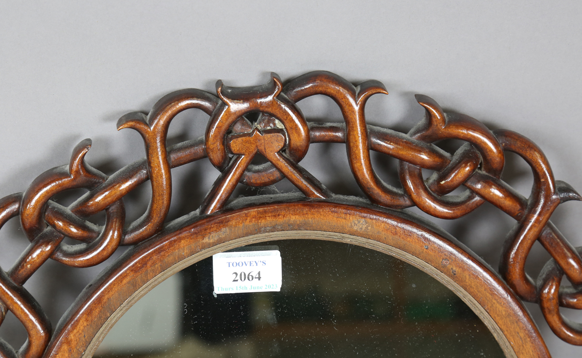 A 20th century Chinese style hardwood circular wall mirror with a carved and pierced frame, diameter - Image 4 of 4