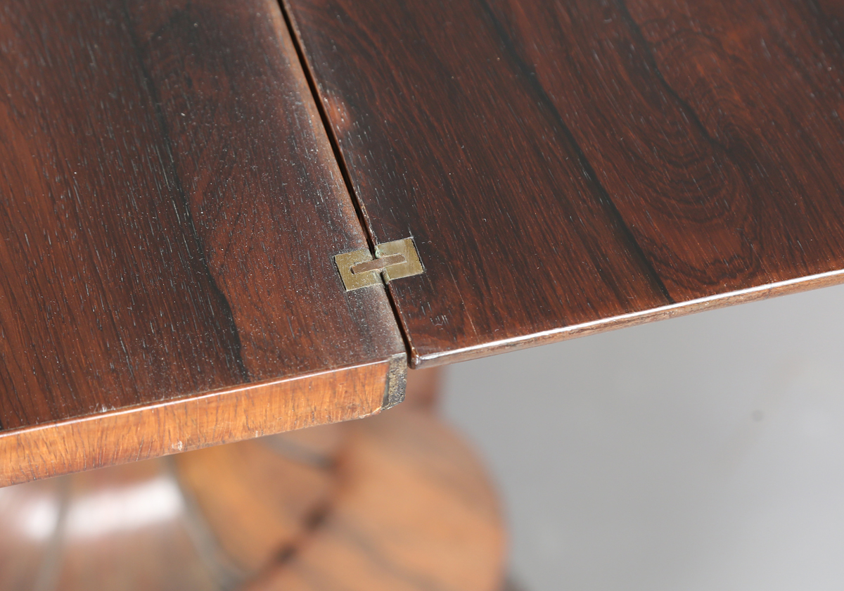 An early Victorian rosewood fold-over tea table, the frieze with applied foliate carved - Image 9 of 11