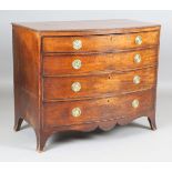 A George III mahogany bowfront chest of oak-lined drawers, the top drawer with a baize-lined