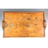 An Italian olivewood tea tray, inlaid with four swallows and painted with a blossoming branch,