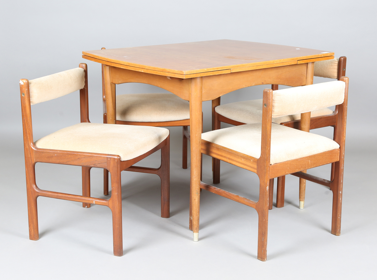 A mid-20th century retro design teak extending draw-leaf dining table, height 76cm, length 98cm,