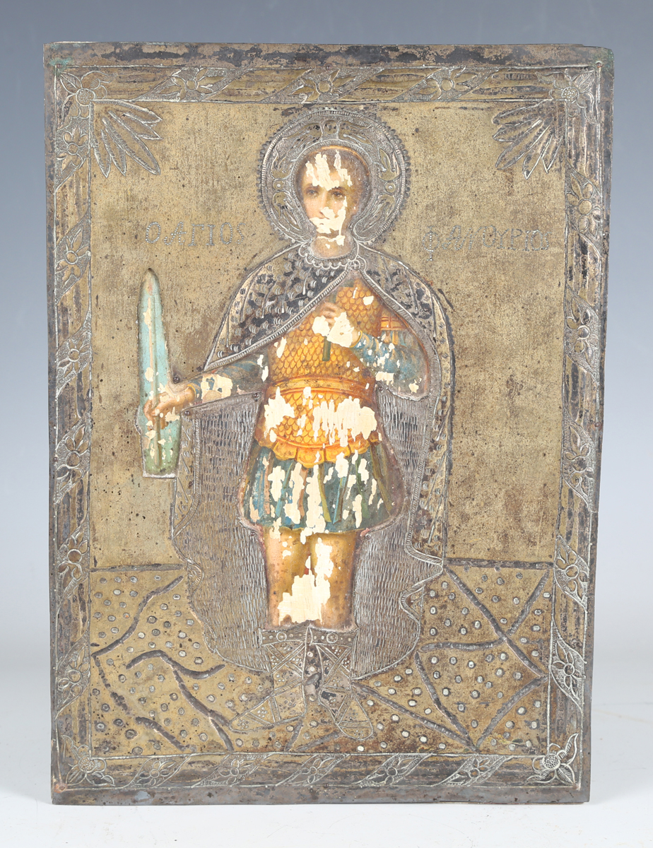 A late 19th/early 20th century Greek icon depicting Saint Agios Fanourios, the painted wood plaque