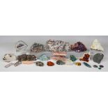 A selection of mineral specimens, including malachite, amethyst, fluorite and tourmaline, length