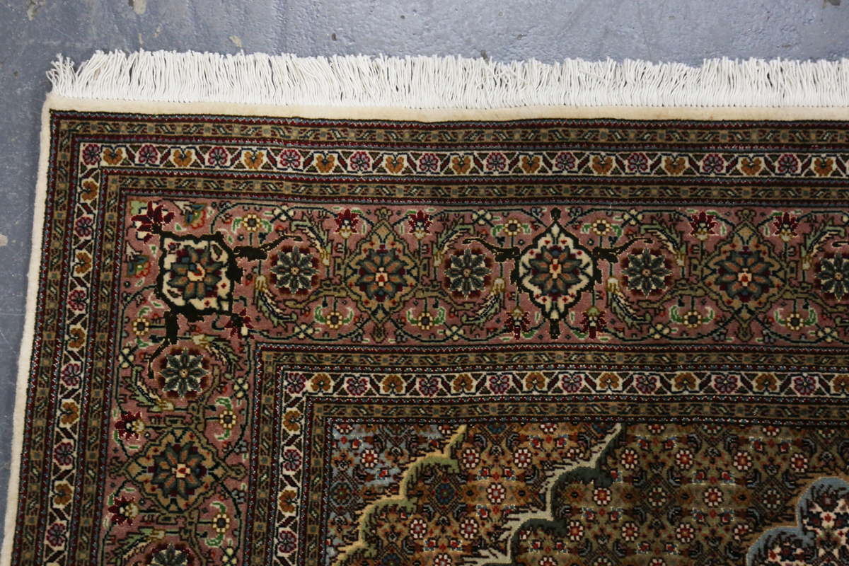 A Tabriz rug, Central Persia, late 20th century, the lobed medallion within a surround of profuse - Image 3 of 7
