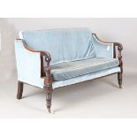 A Regency mahogany framed settee with scroll arms and turned legs, height 82cm, width 150cm, depth