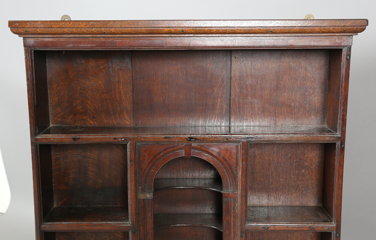 A 18th century and later provincial oak wall shelf with central arched niche, height 99cm, width - Image 5 of 5