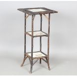 A late Victorian bamboo three-tier occasional table, inset with brown transfer printed Wedgwood