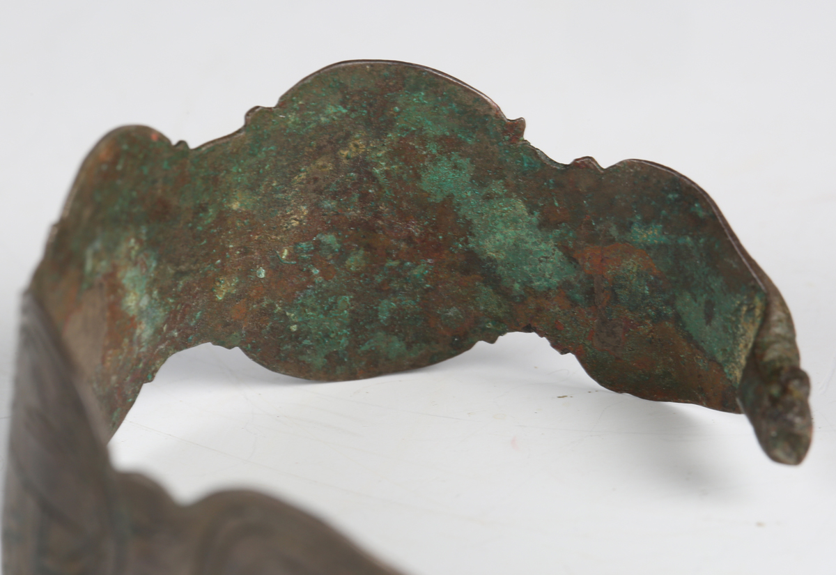 A European Saxon bronze bracelet, engraved with bird and geometric design, width 6.2cm. - Image 3 of 10