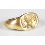 A Roman gold intaglio ring, the oval bezel cut with a profile portrait, width 2cm. Note: from the