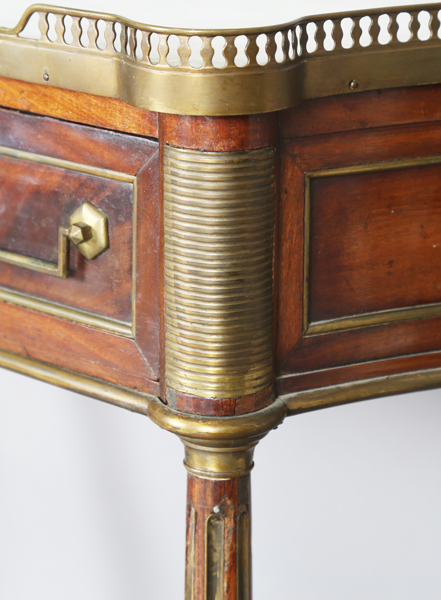 A French Empire mahogany and gilt metal mounted console table, the shaped top inset with white - Image 10 of 20
