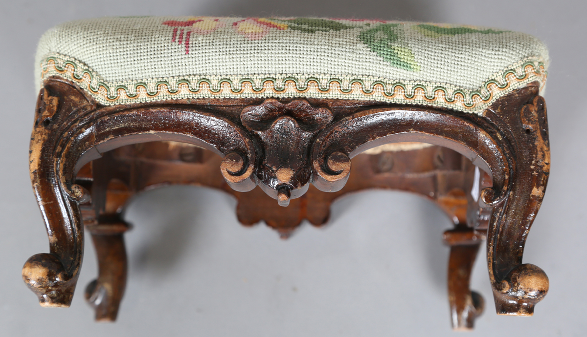 A pair of late Victorian walnut footstools, each with a needlework top, on carved legs, height 16cm, - Image 3 of 7