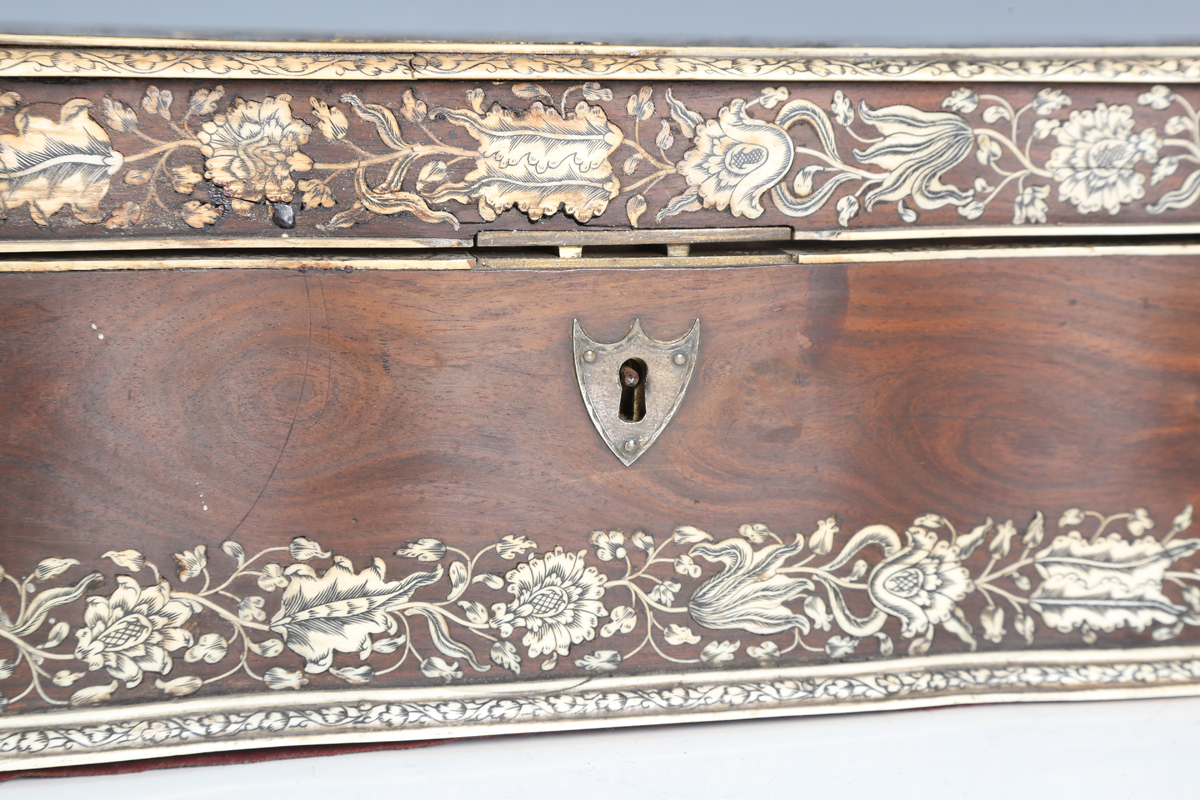 A late 18th century Indo-Portuguese hardwood and ivory inlaid workbox, the serpentine shaped lid - Image 15 of 16