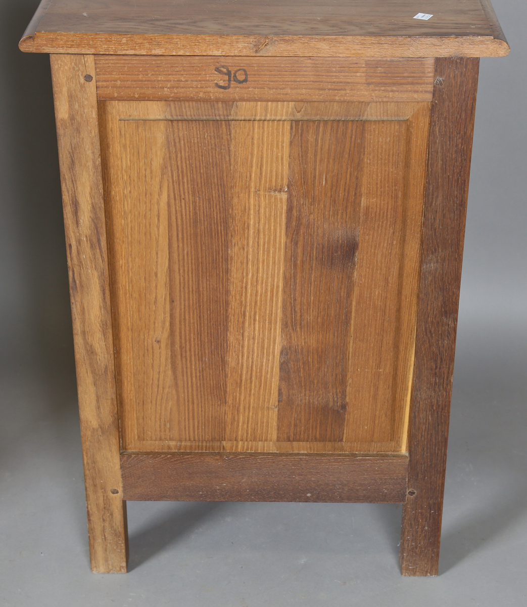 A pair of late 20th century French oak bedside cabinets, each fitted with a finely carved drawer and - Image 3 of 17