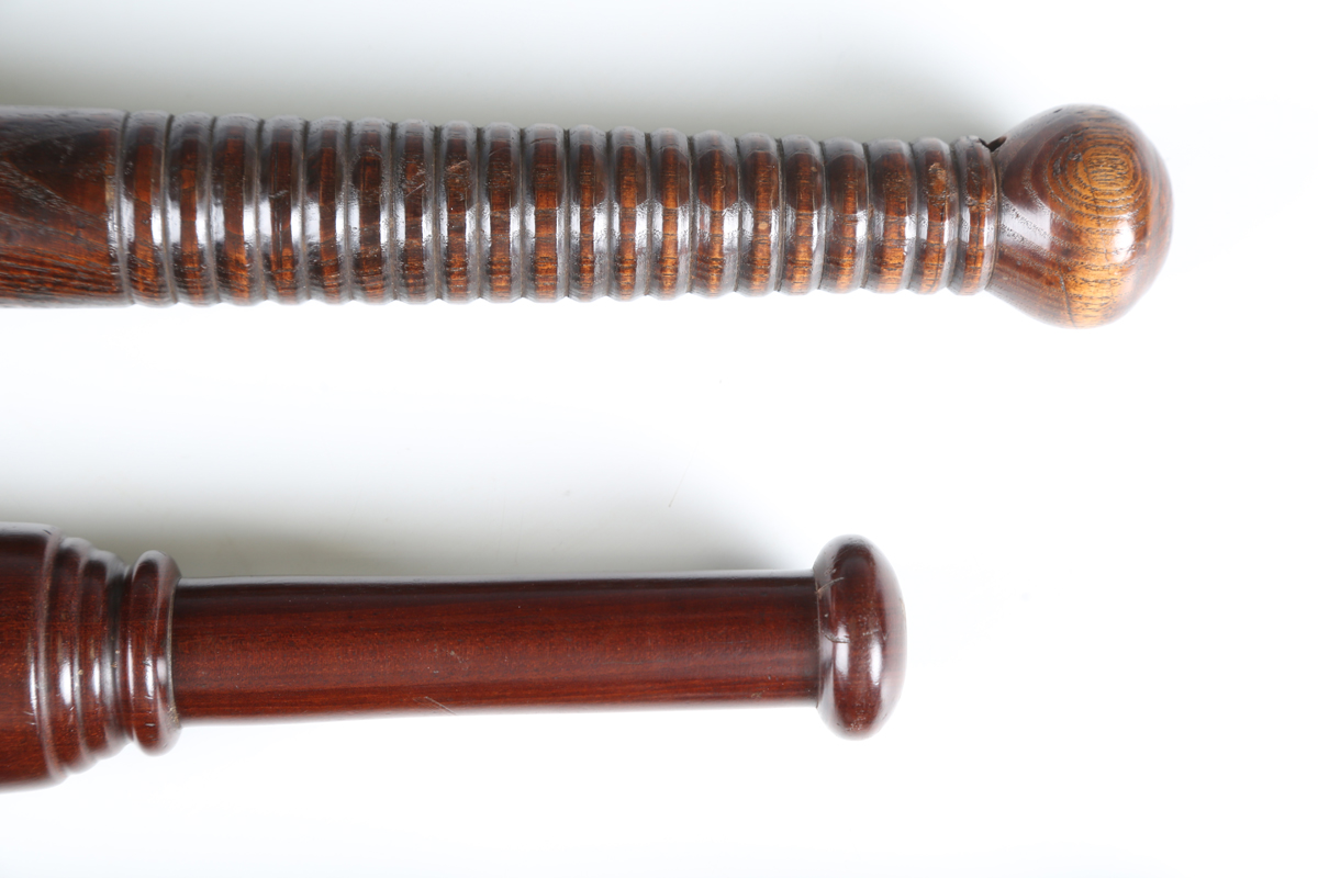 A Victorian ebonized wooden policeman's truncheon of tapering form with a shaped ribbed handle, - Image 10 of 11
