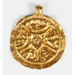 A late Roman gold bracteate circular pendant drop, retaining suspension loop, diameter 2cm. Note: