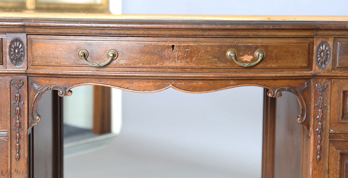 An Edwardian walnut twin pedestal desk by Gillows of Lancaster, the breakfront top inset with - Image 6 of 12