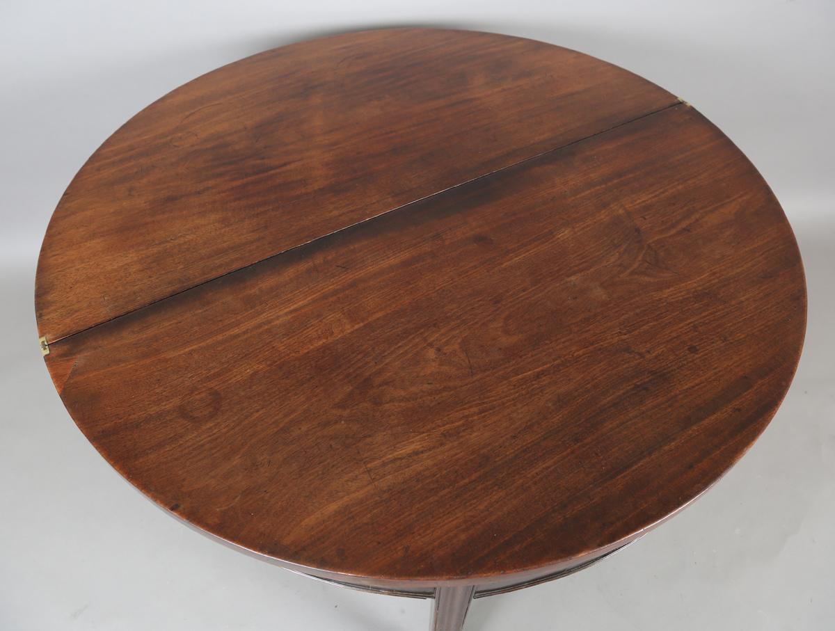 An early 19th century mahogany demi-lune fold-over tea table, raised on block legs, height 76cm, - Image 4 of 7