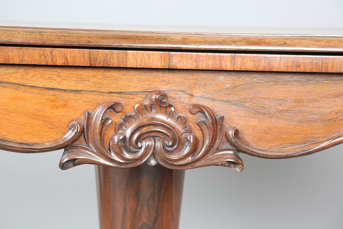 An early Victorian rosewood fold-over tea table, the frieze with applied foliate carved - Image 6 of 11