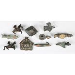A collection of Romano-British zoomorphic and other plate type brooches, including a sandal, fish,