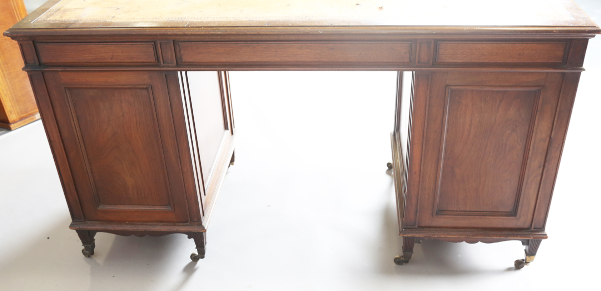 An Edwardian walnut twin pedestal desk by Gillows of Lancaster, the breakfront top inset with - Image 3 of 12