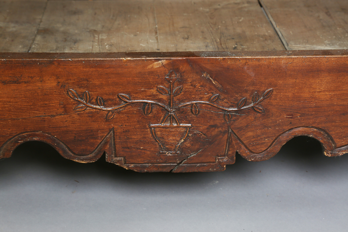 An 18th century French provincial walnut cabinet, fitted with two drawers above panelled doors, - Image 8 of 20