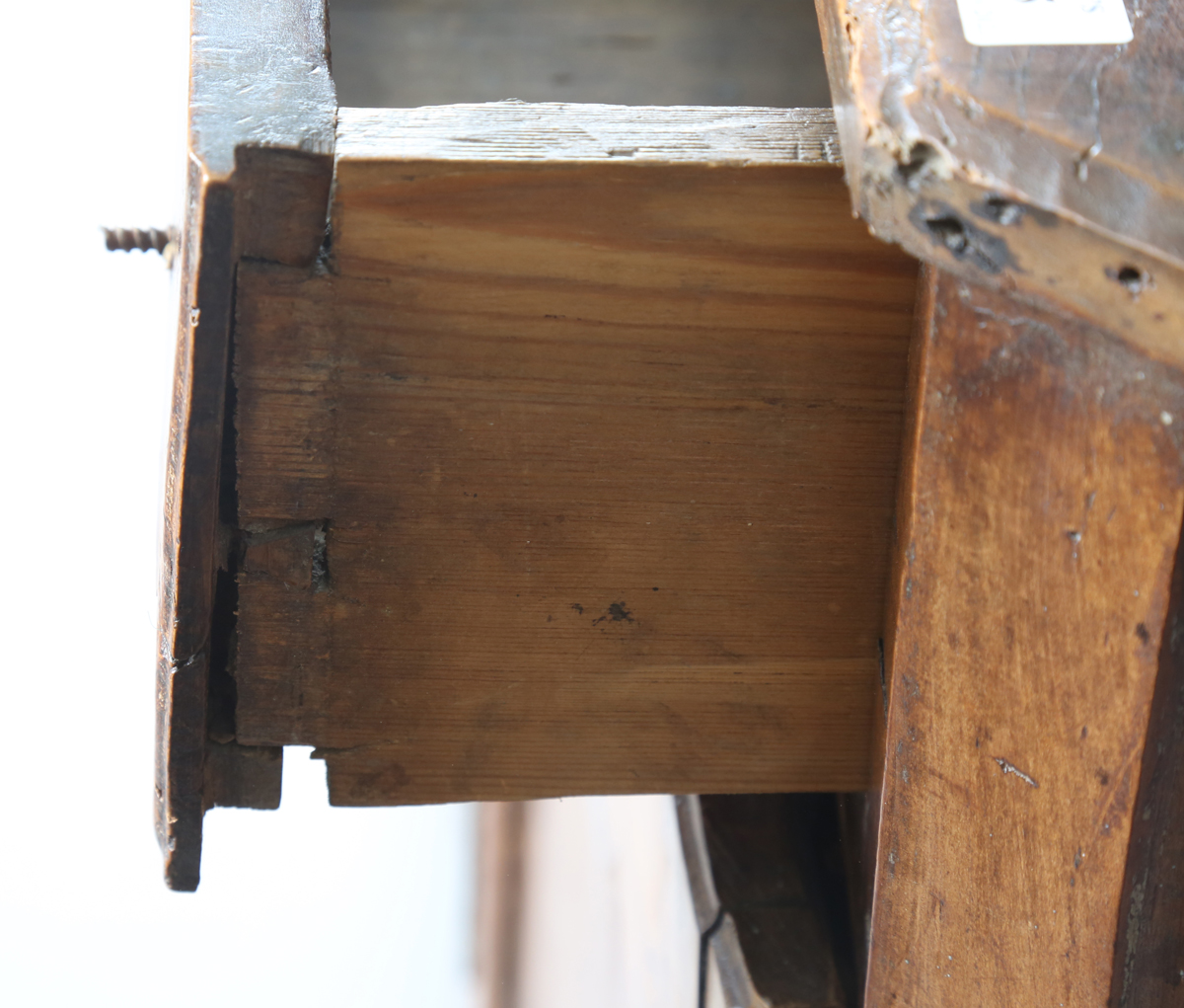 An 18th century French provincial walnut cabinet, fitted with two drawers above panelled doors, - Image 16 of 20