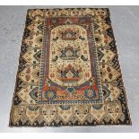 A small Afshar rug, South-west Persia, early 20th century, the ivory field with three baskets of