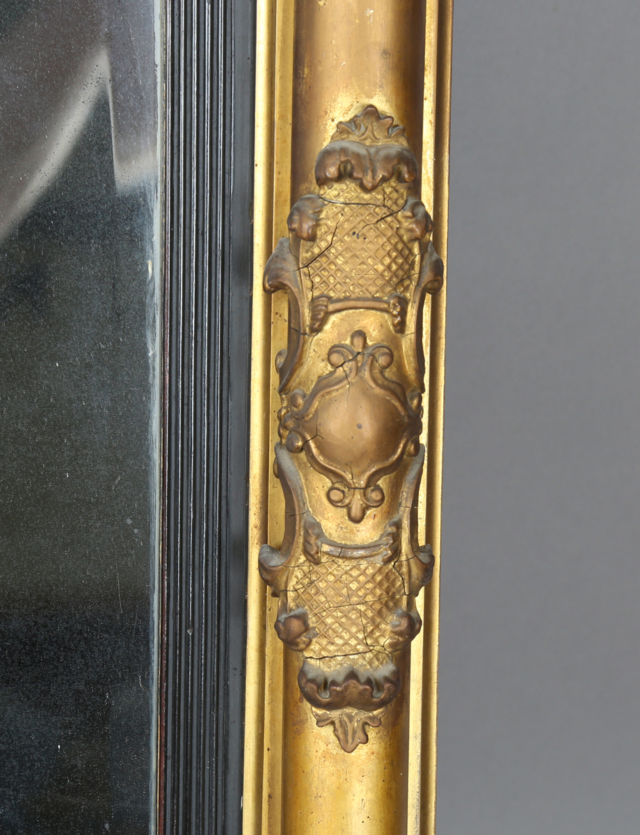 An early 19th century giltwood pier mirror with a carved foliate frieze and foliate cartouche- - Image 5 of 11