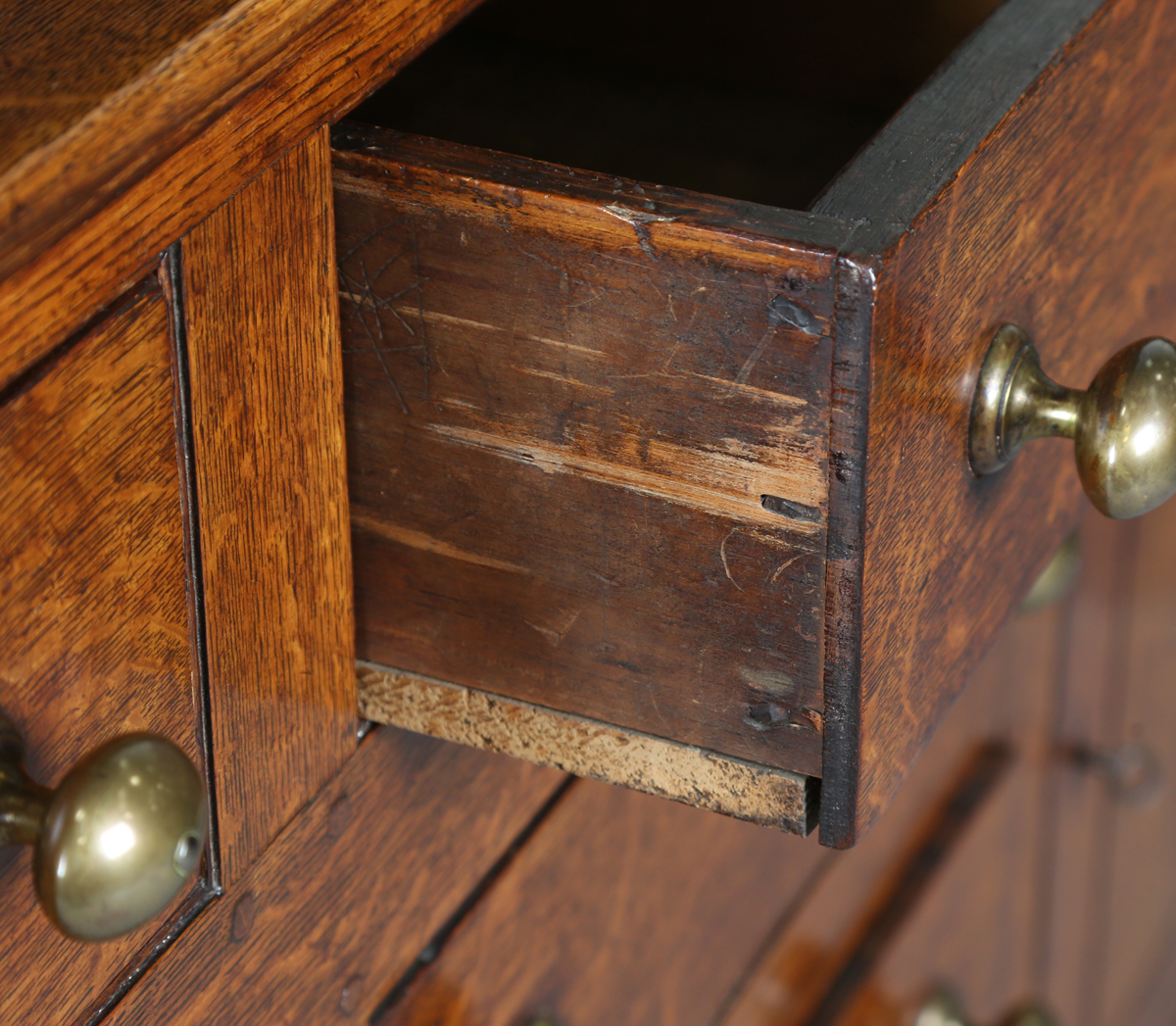 A late George III provincial oak dresser, the shelf back with blue painted backboards, the base with - Image 7 of 9