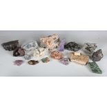A collection of mineral specimens, including galena, barytes, orbicular granite, dogtooth calcite,