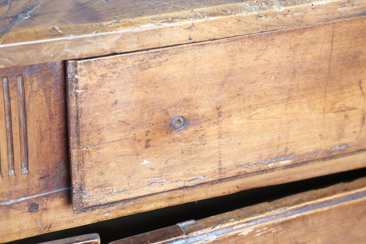 An 18th century French provincial walnut cabinet, fitted with two drawers above panelled doors, - Image 15 of 20