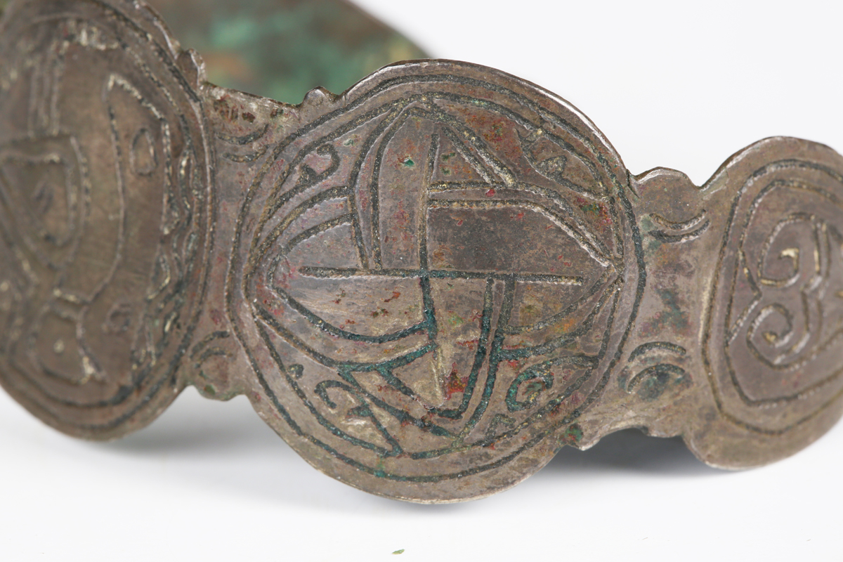 A European Saxon bronze bracelet, engraved with bird and geometric design, width 6.2cm. - Image 9 of 10