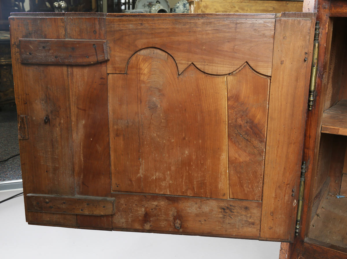 An 18th century French provincial walnut cabinet, fitted with two drawers above panelled doors, - Image 10 of 20