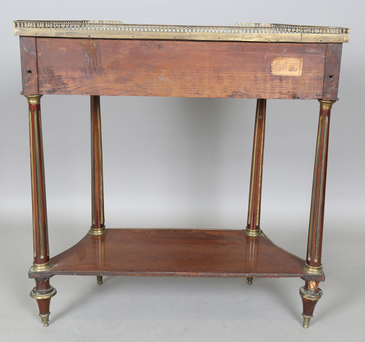 A French Empire mahogany and gilt metal mounted console table, the shaped top inset with white - Image 4 of 20