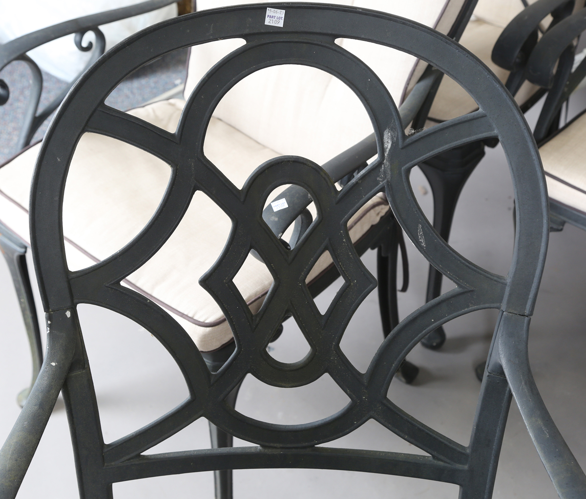 A set of six modern black painted cast alloy garden chairs with fitted loose cushions, height - Image 6 of 6