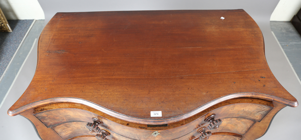 An 18th century and later mahogany serpentine fronted chest of three drawers with later carved - Image 11 of 11