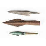 A Roman iron socketed arrowhead, 18cm, together with two other ancient bronze arrowheads. Note: from